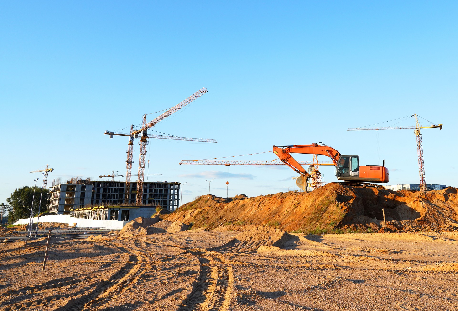 Construction site. Buildings under construction. Tower Cranes on Residential Buildings construction.